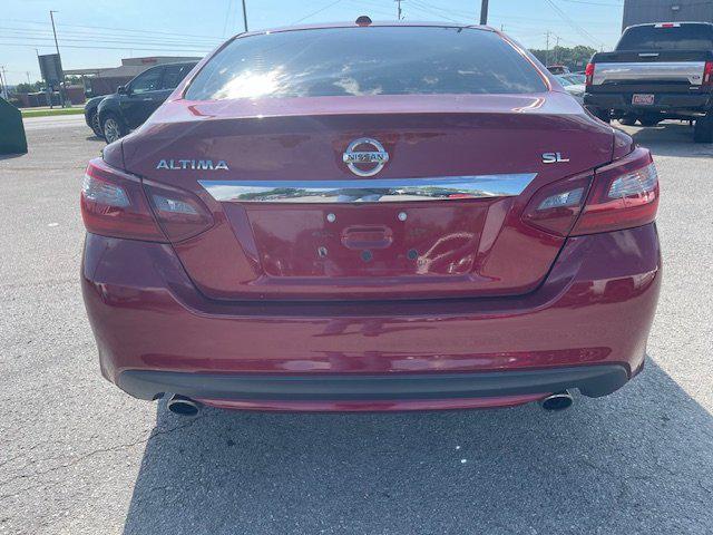 used 2018 Nissan Altima car, priced at $9,995