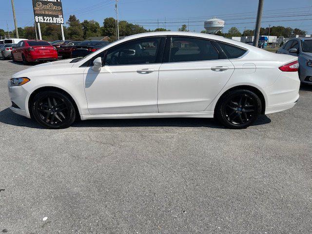 used 2014 Ford Fusion car, priced at $7,995