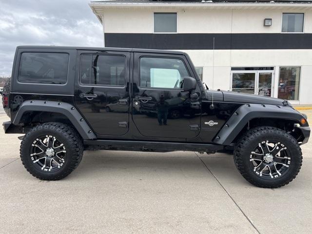 used 2015 Jeep Wrangler Unlimited car, priced at $22,555