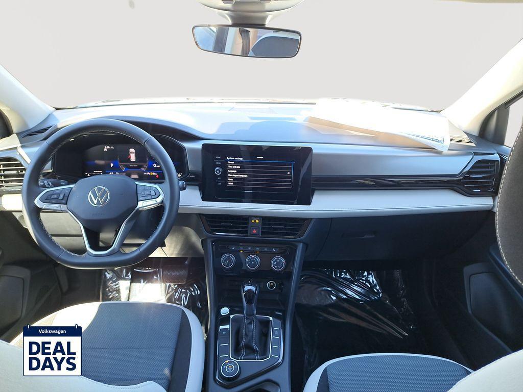new 2025 Volkswagen Taos car, priced at $28,211