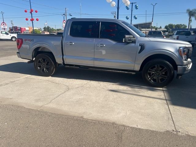 used 2022 Ford F-150 car, priced at $49,800