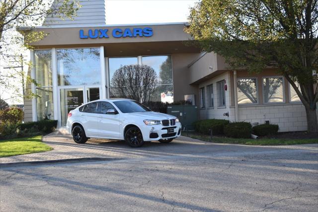 used 2017 BMW X4 car, priced at $22,890