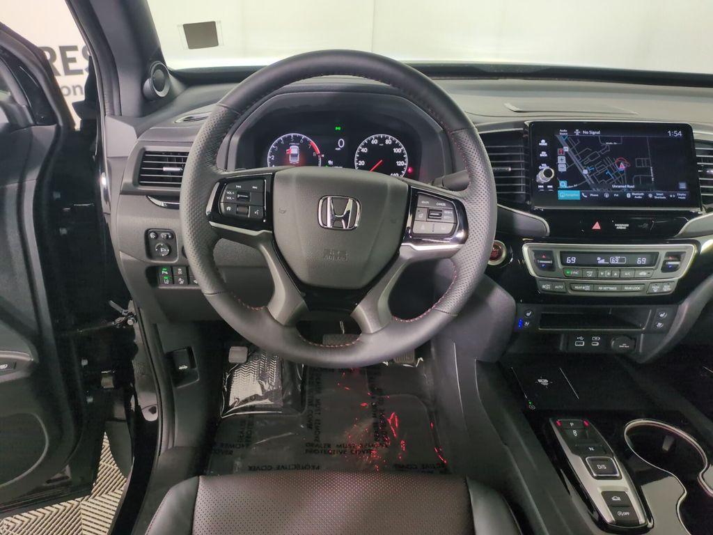 used 2025 Honda Ridgeline car, priced at $45,999