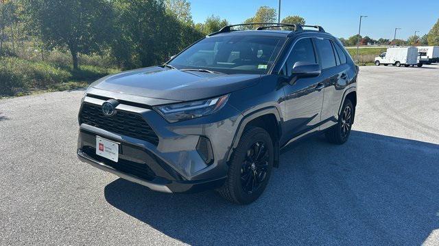 used 2023 Toyota RAV4 Hybrid car, priced at $28,000