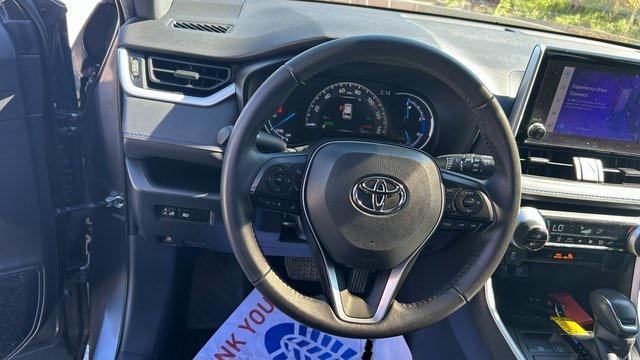 used 2023 Toyota RAV4 Hybrid car, priced at $28,000
