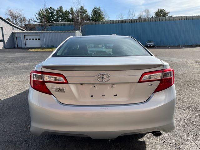 used 2014 Toyota Camry car, priced at $14,000