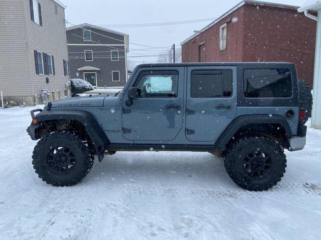 used 2015 Jeep Wrangler Unlimited car, priced at $23,850