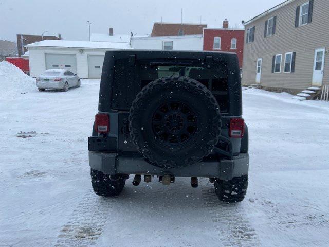 used 2015 Jeep Wrangler Unlimited car, priced at $23,850