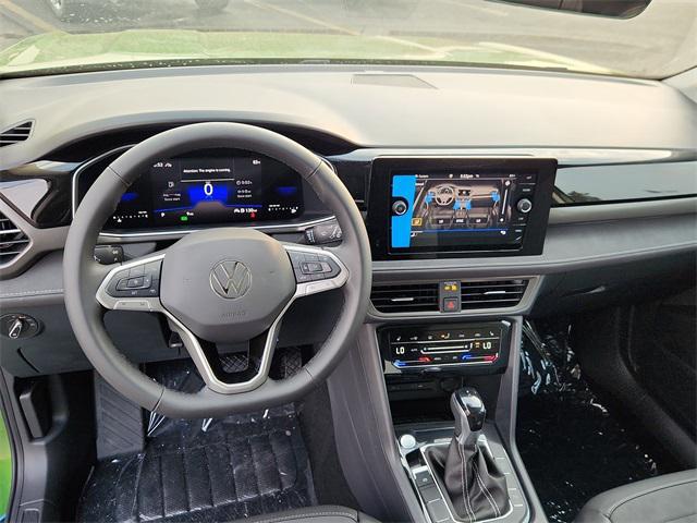 new 2025 Volkswagen Taos car, priced at $31,983