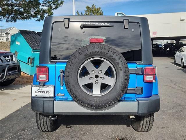 used 2015 Jeep Wrangler Unlimited car, priced at $17,399