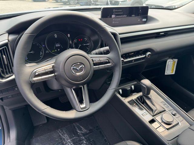 new 2025 Mazda CX-50 Hybrid car, priced at $34,721