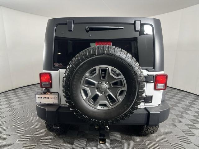 used 2013 Jeep Wrangler Unlimited car, priced at $26,964