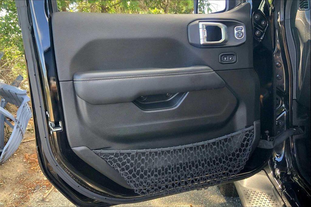 used 2021 Jeep Wrangler Unlimited car, priced at $31,010