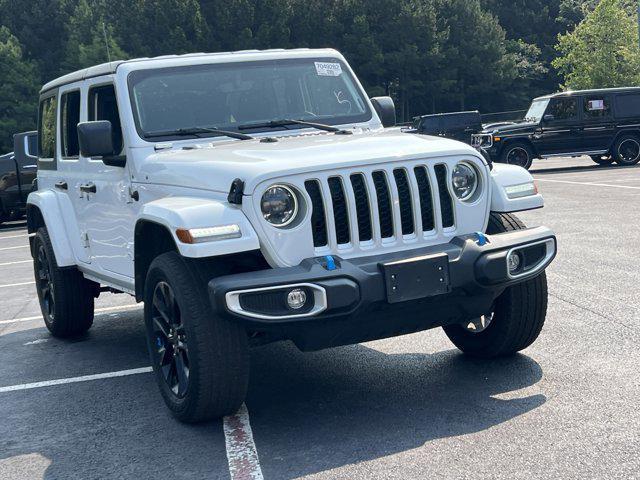 used 2023 Jeep Wrangler 4xe car, priced at $33,858