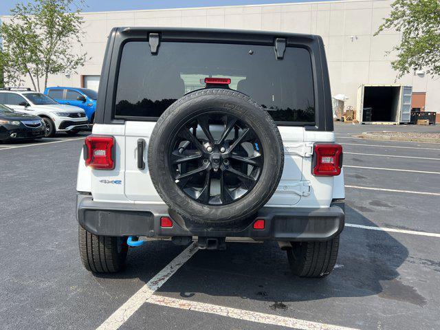 used 2023 Jeep Wrangler 4xe car, priced at $33,858