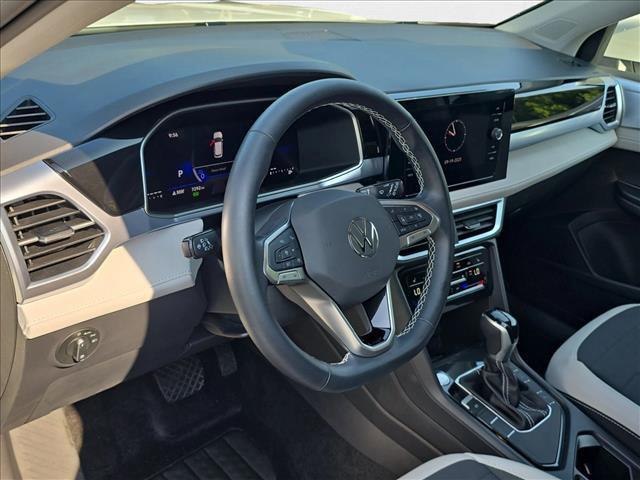used 2025 Volkswagen Taos car, priced at $23,069