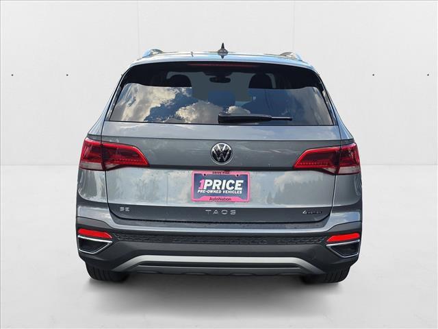 used 2024 Volkswagen Taos car, priced at $23,069