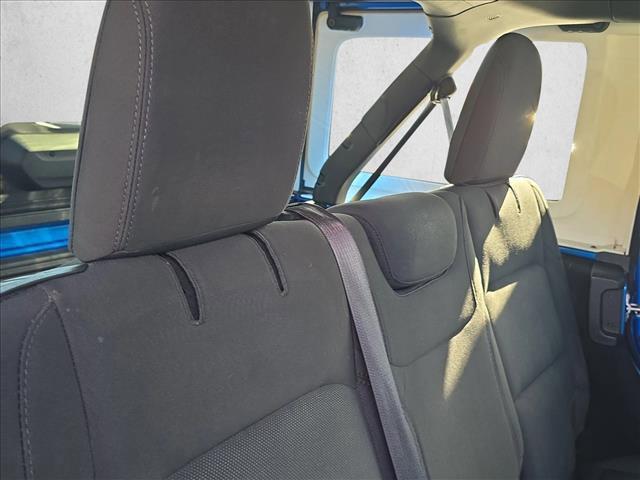 used 2023 Jeep Wrangler car, priced at $34,369