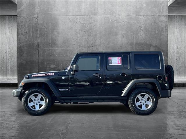 used 2012 Jeep Wrangler Unlimited car, priced at $23,278