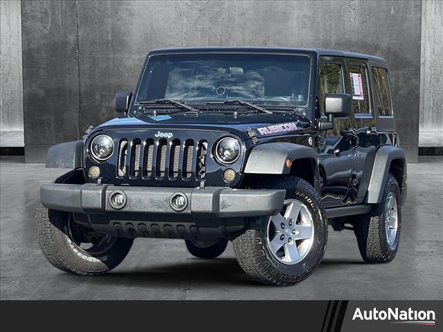 used 2012 Jeep Wrangler Unlimited car, priced at $23,278