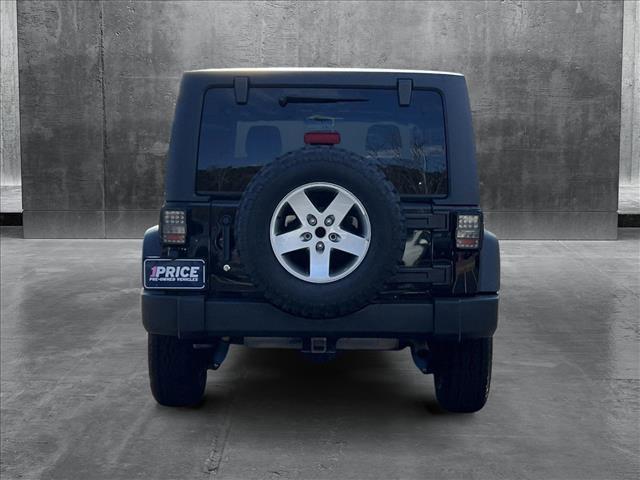 used 2012 Jeep Wrangler Unlimited car, priced at $23,278