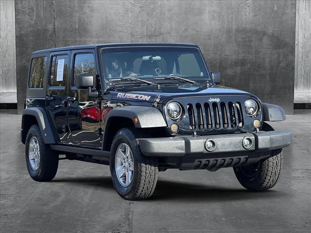 used 2012 Jeep Wrangler Unlimited car, priced at $23,278