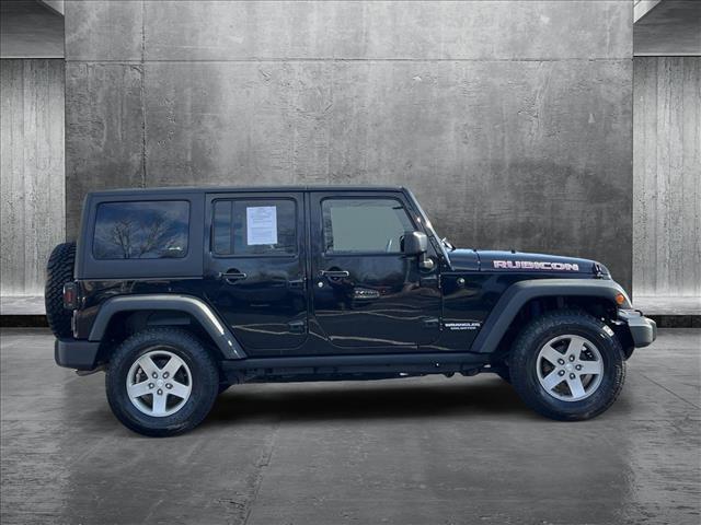 used 2012 Jeep Wrangler Unlimited car, priced at $23,278