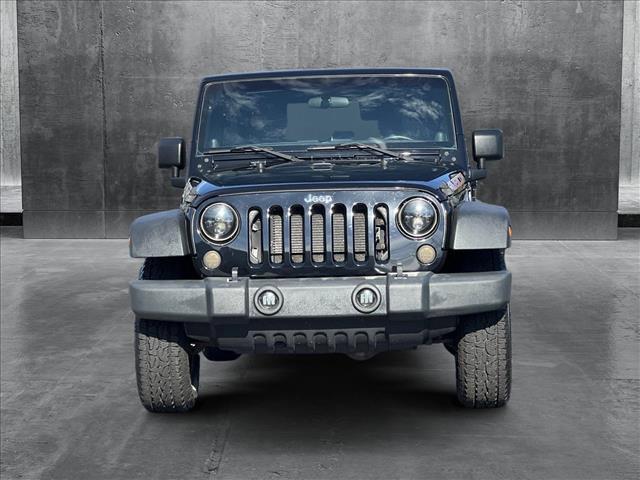 used 2012 Jeep Wrangler Unlimited car, priced at $23,278