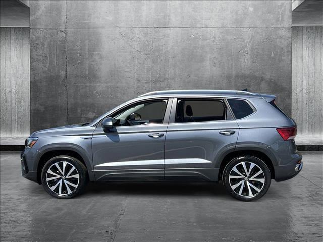 used 2024 Volkswagen Taos car, priced at $23,397