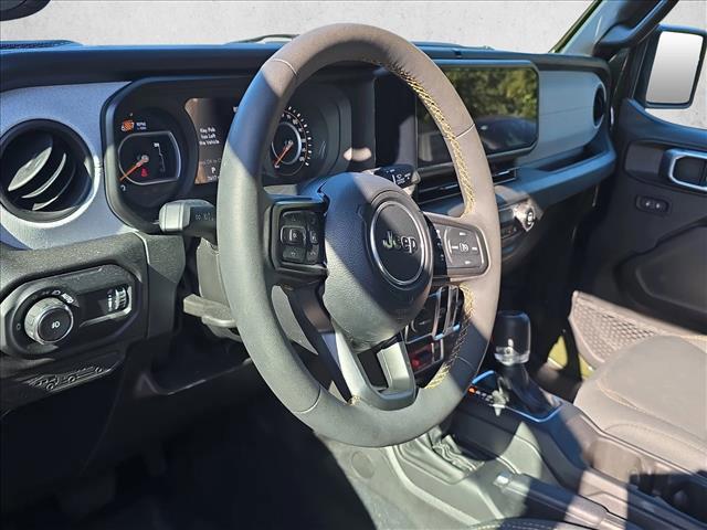 used 2024 Jeep Wrangler car, priced at $39,269