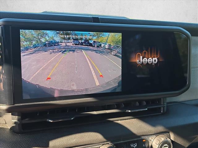 used 2024 Jeep Wrangler car, priced at $39,269