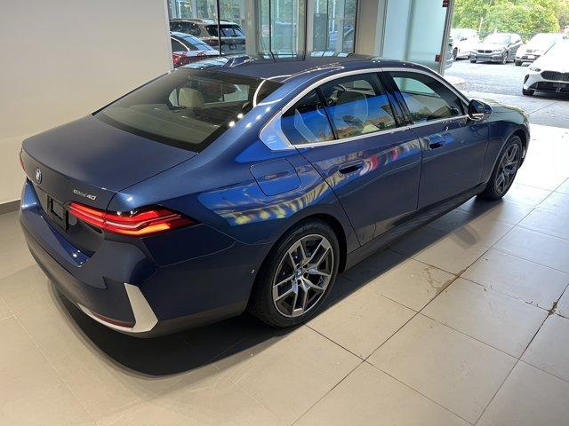 used 2024 BMW i5 car, priced at $49,491