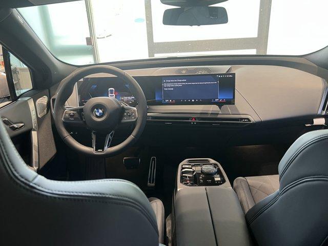 new 2026 BMW iX car, priced at $98,275