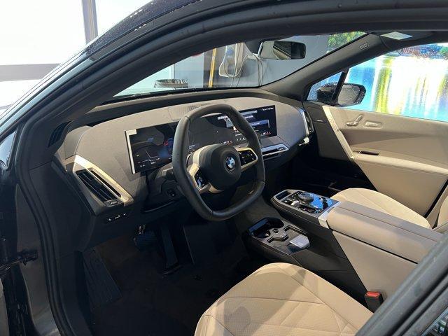 new 2026 BMW iX car, priced at $90,275