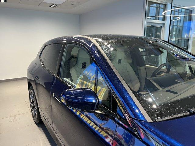 new 2026 BMW iX car, priced at $90,275