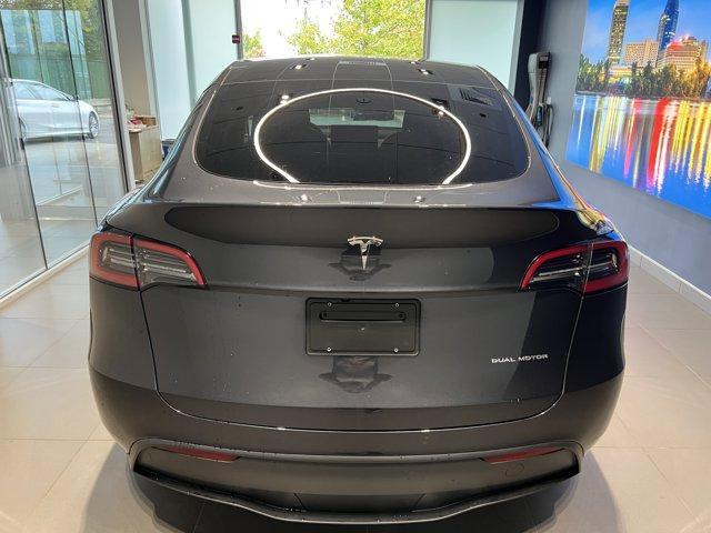 used 2025 Tesla Model Y car, priced at $35,791