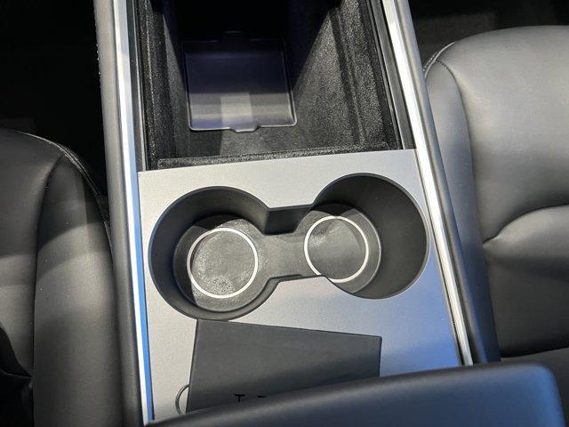 used 2025 Tesla Model Y car, priced at $35,791