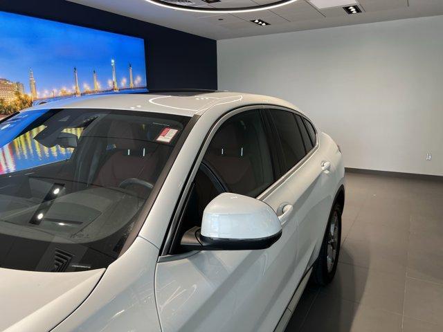 used 2024 BMW X4 car, priced at $49,991