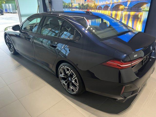 used 2025 BMW i5 car, priced at $61,299