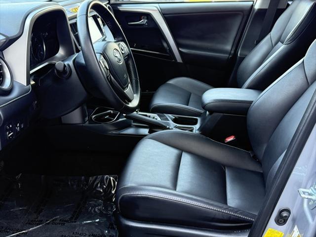 used 2018 Toyota RAV4 Hybrid car, priced at $25,499