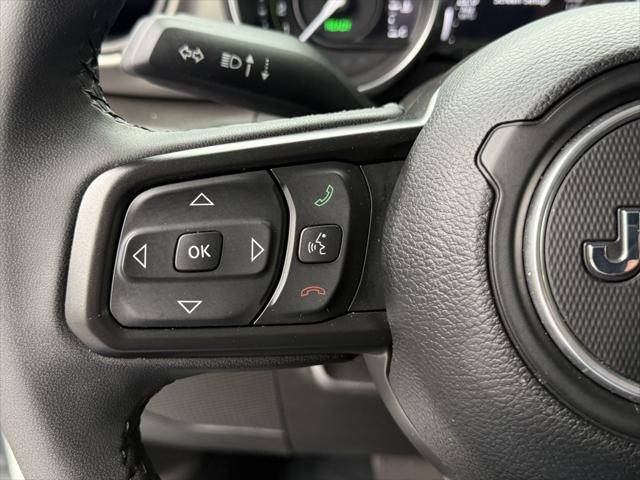 used 2023 Jeep Wrangler 4xe car, priced at $35,999