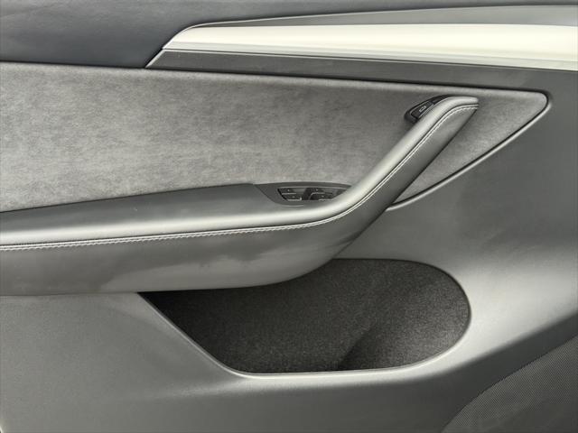 used 2025 Tesla Model Y car, priced at $41,682