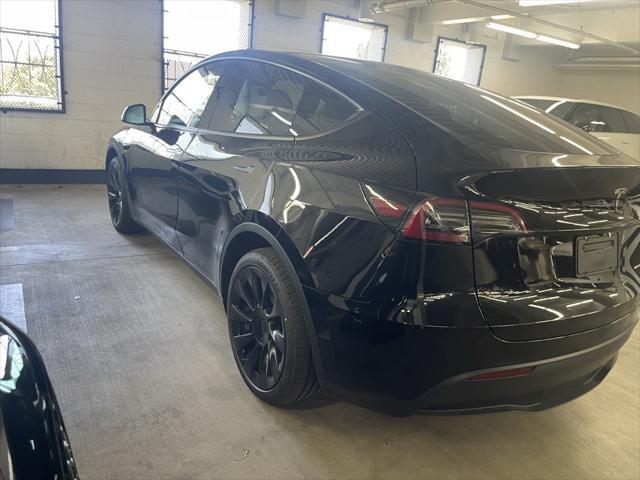 used 2025 Tesla Model Y car, priced at $41,682