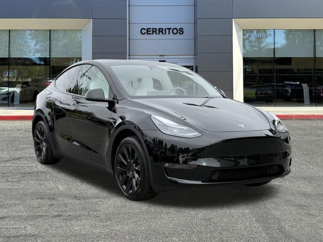 used 2025 Tesla Model Y car, priced at $41,682