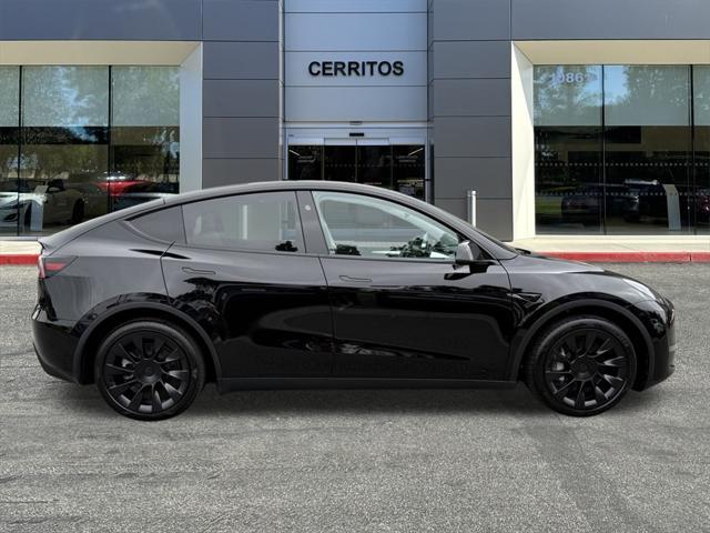 used 2025 Tesla Model Y car, priced at $41,682