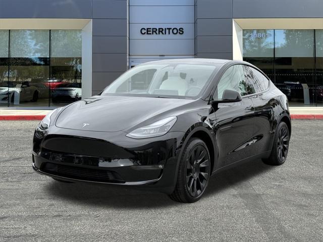 used 2025 Tesla Model Y car, priced at $41,682