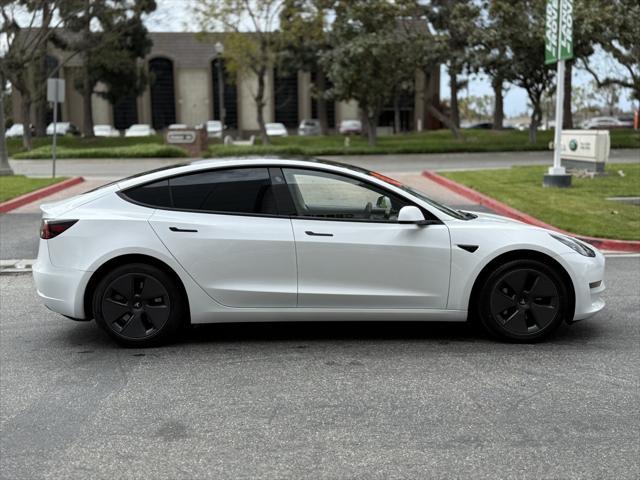 used 2023 Tesla Model 3 car, priced at $21,999