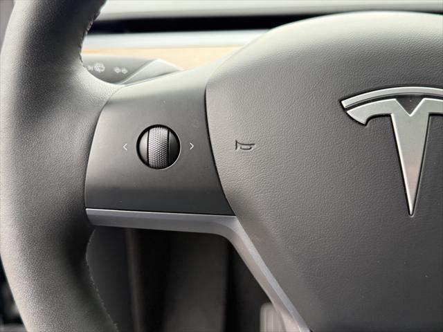 used 2024 Tesla Model Y car, priced at $37,595