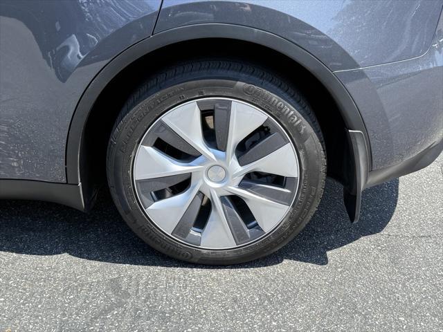 used 2023 Tesla Model Y car, priced at $29,999