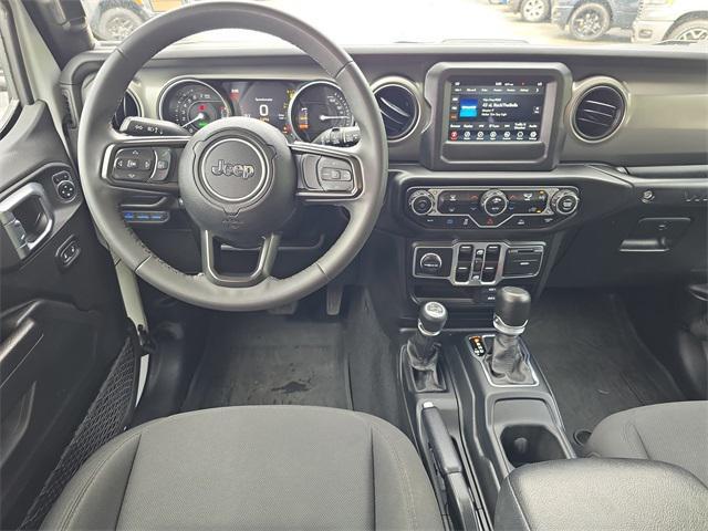 used 2023 Jeep Wrangler 4xe car, priced at $28,998